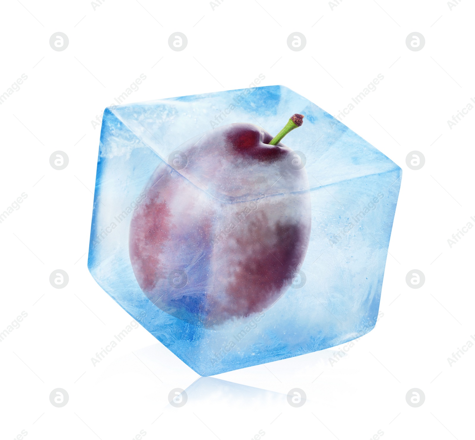 Image of Frozen food. Raw plum in ice cube isolated on white