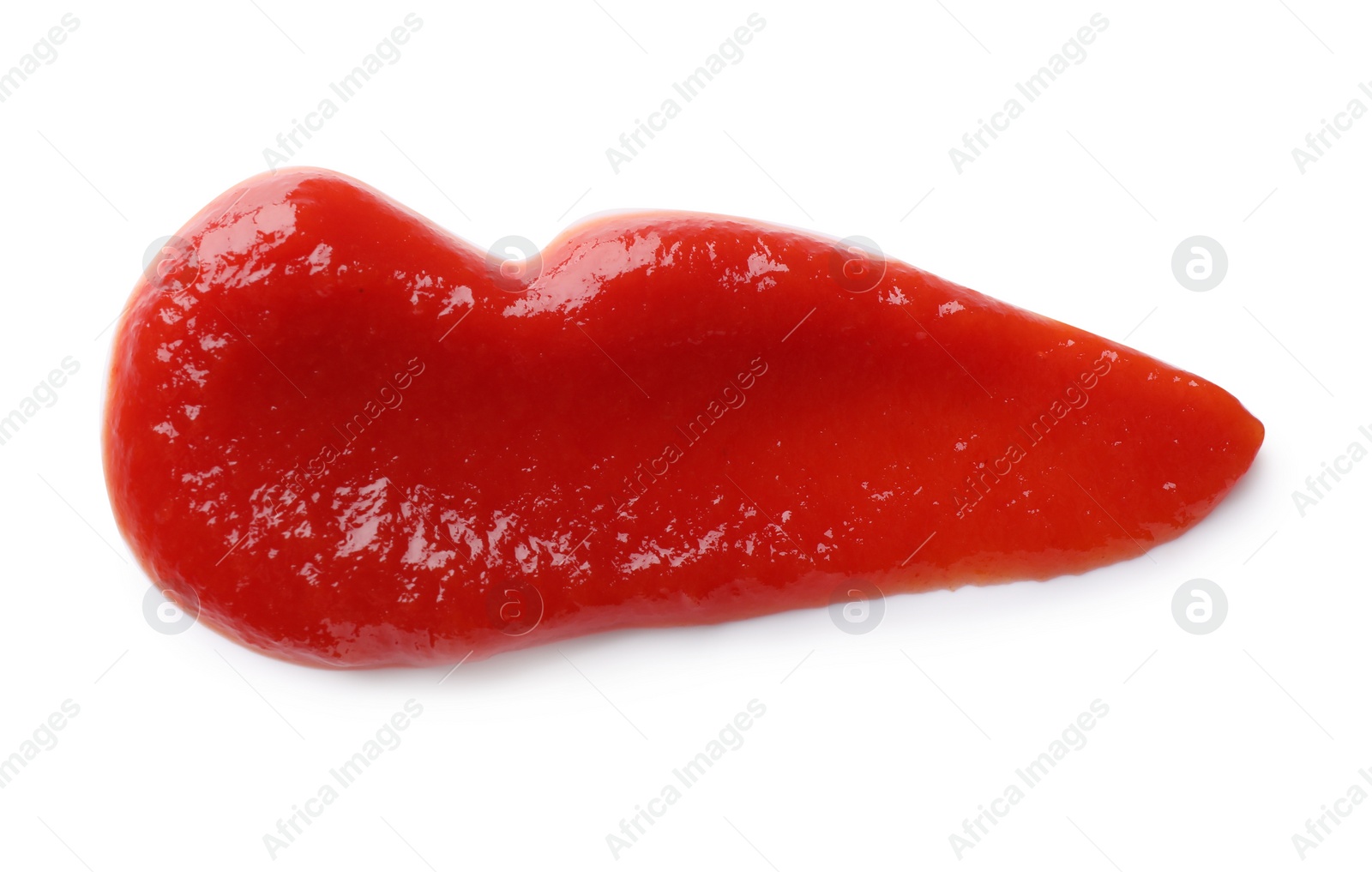 Photo of Smear of tasty ketchup on white background, top view