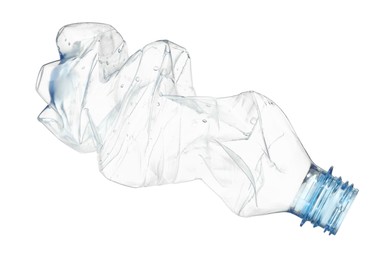 Photo of Crumpled disposable plastic bottle isolated on white