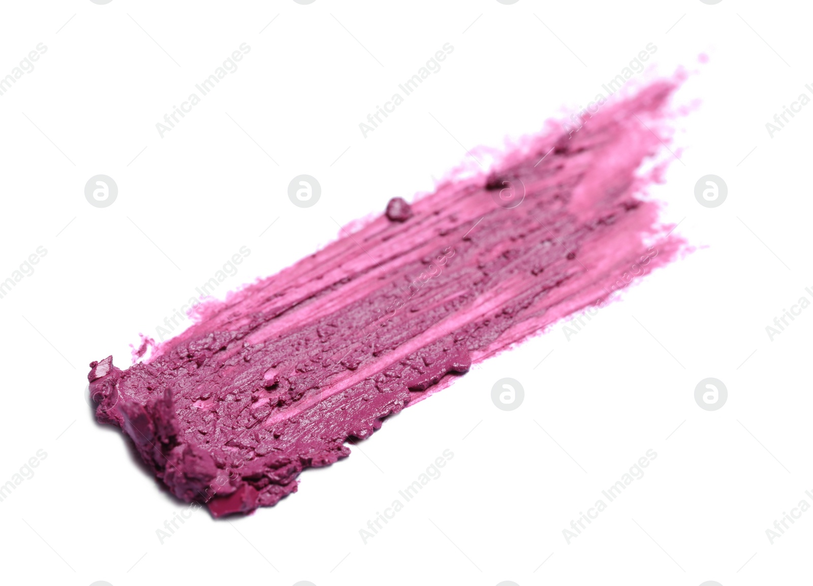 Photo of Smear of bright lipstick on white background