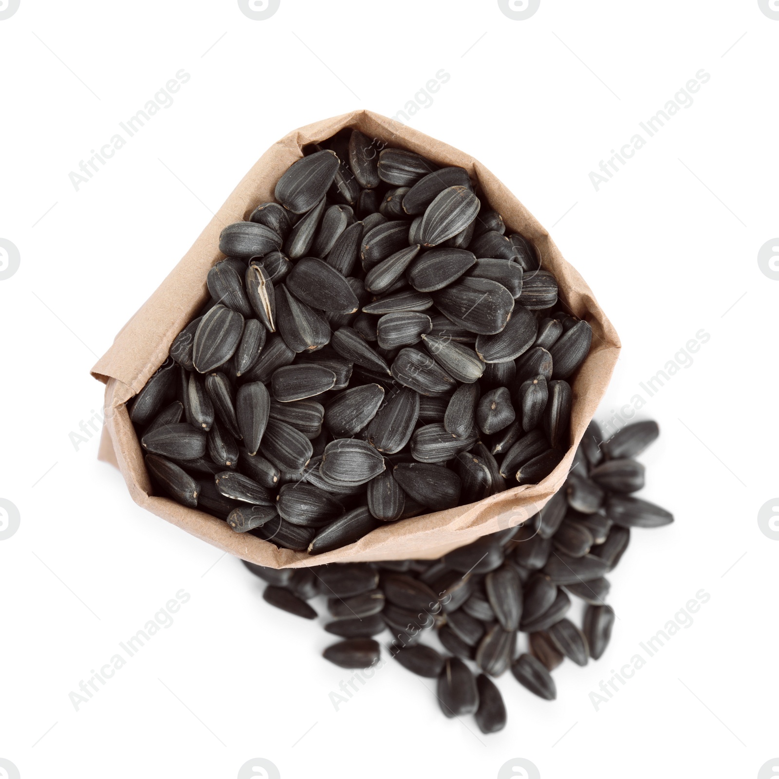 Photo of Sunflower seeds in bag on white background, top view