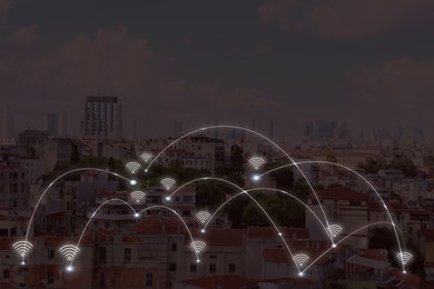 Image of Picturesque view of city with building and wi-fi symbols