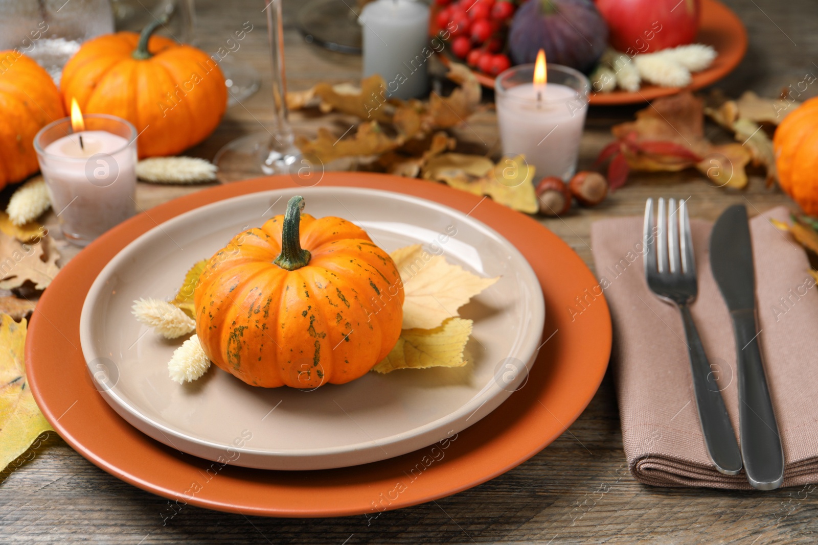 Photo of Beautiful autumn place setting and decor on wooden table