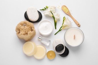 Photo of Flat lay composition with different spa products on white background