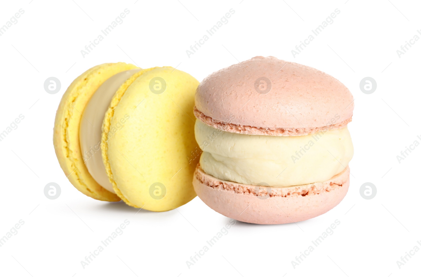 Photo of Colorful macarons on white background. Delicious dessert