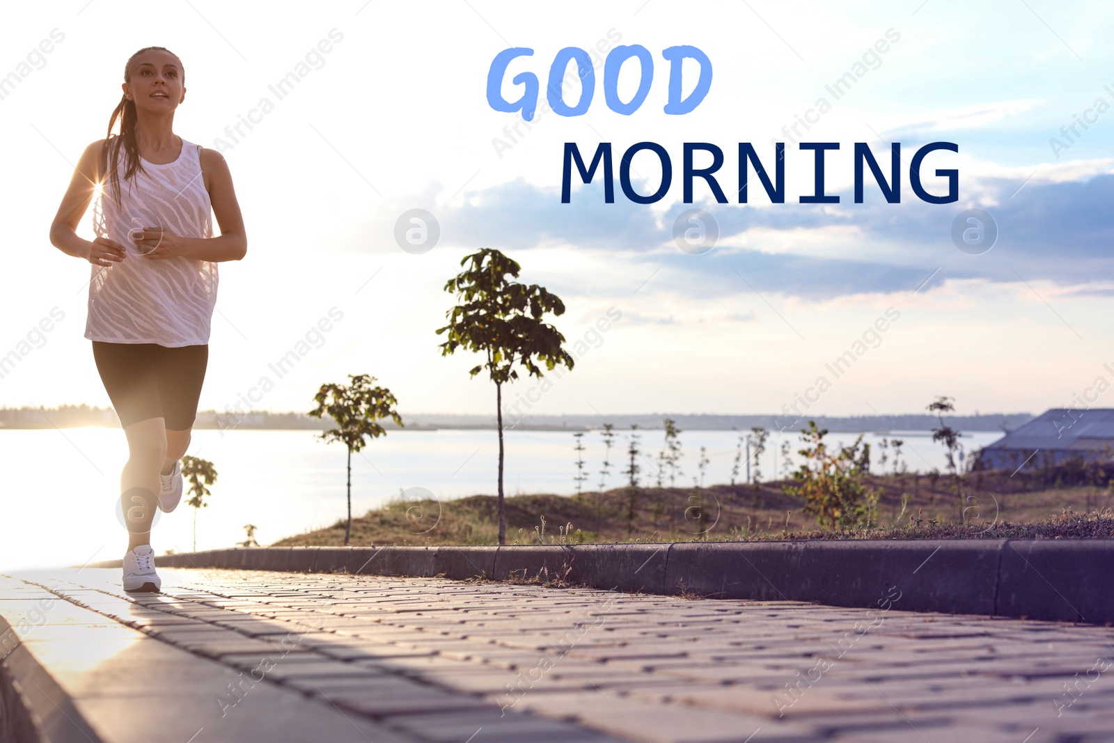 Image of Good Morning! Young woman jogging near river in morning