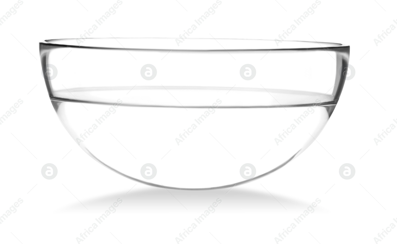 Photo of Glass bowl full of water isolated on white