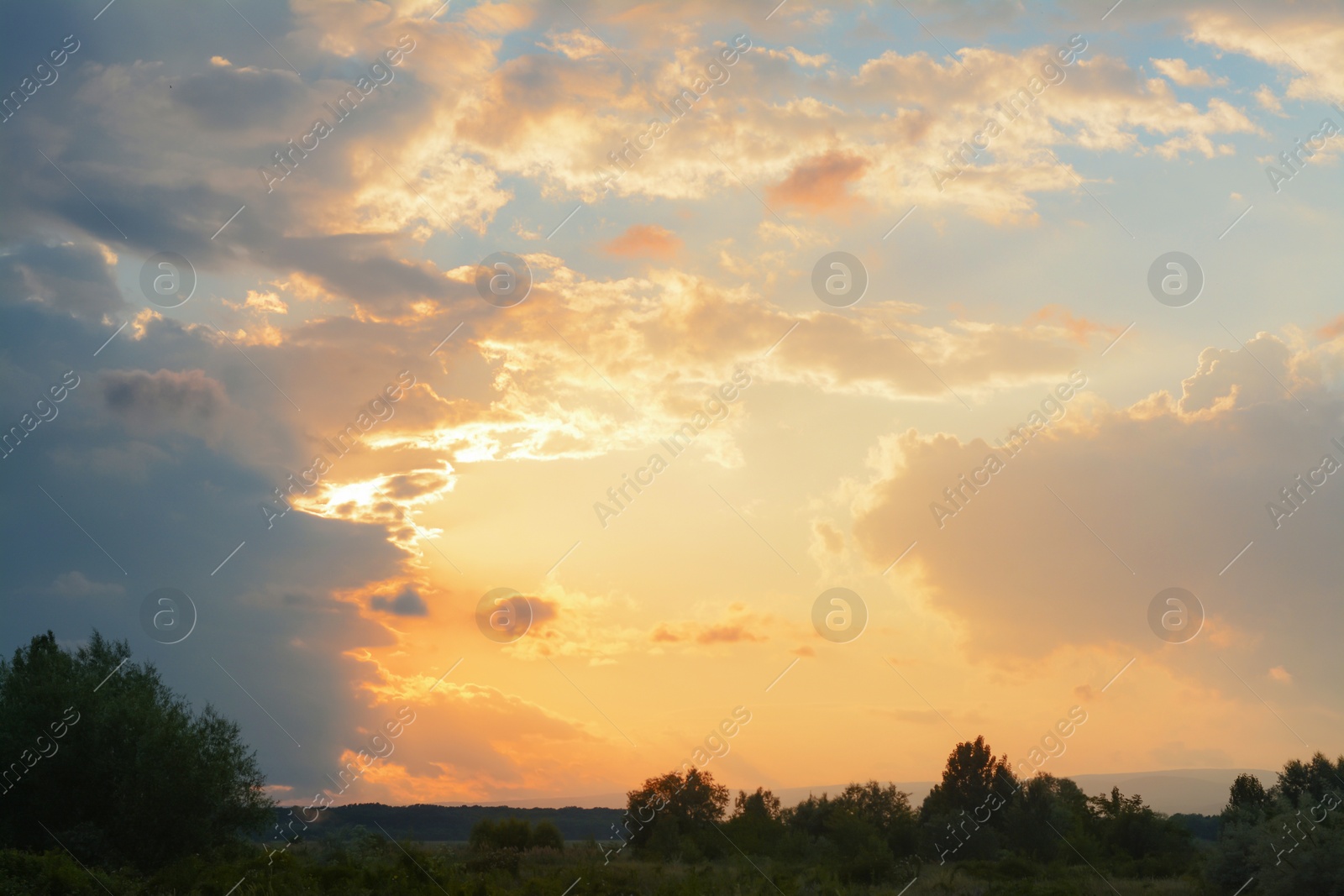 Photo of Picturesque view of beautiful countryside at sunset