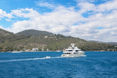 Photo of Beautiful view of sea with boats and coastal city