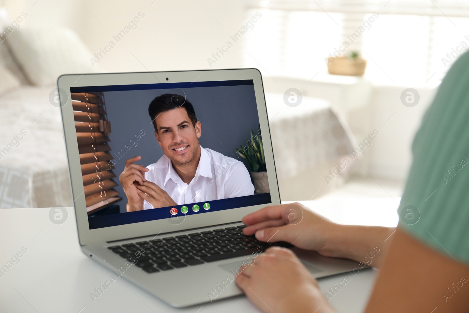 Image of Coworkers working together online. Woman using video chat on laptop, closeup