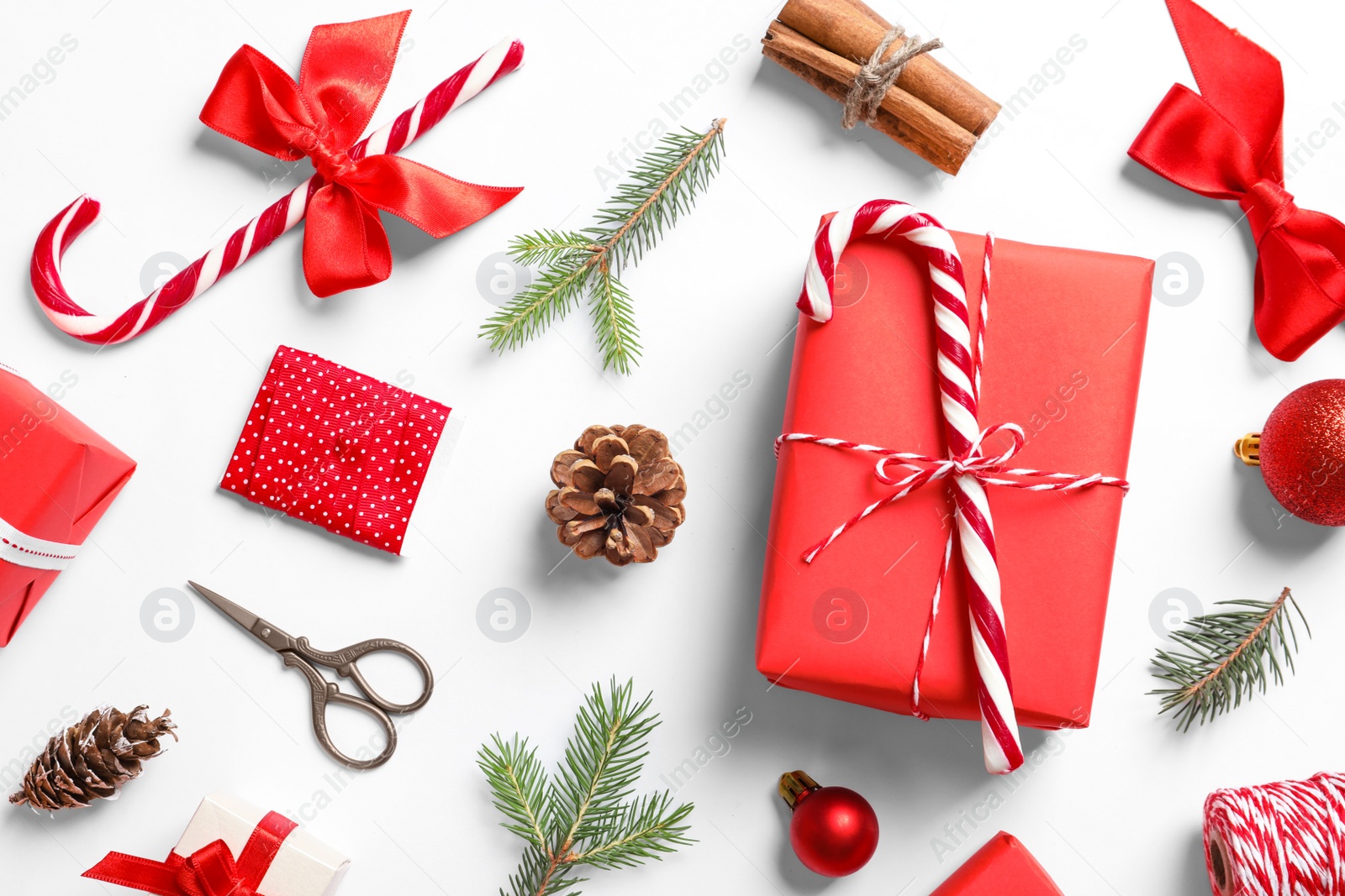 Photo of Flat lay composition with Christmas gifts on white background