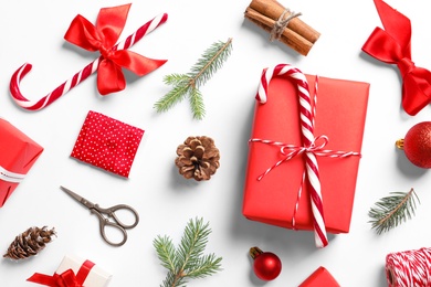 Photo of Flat lay composition with Christmas gifts on white background