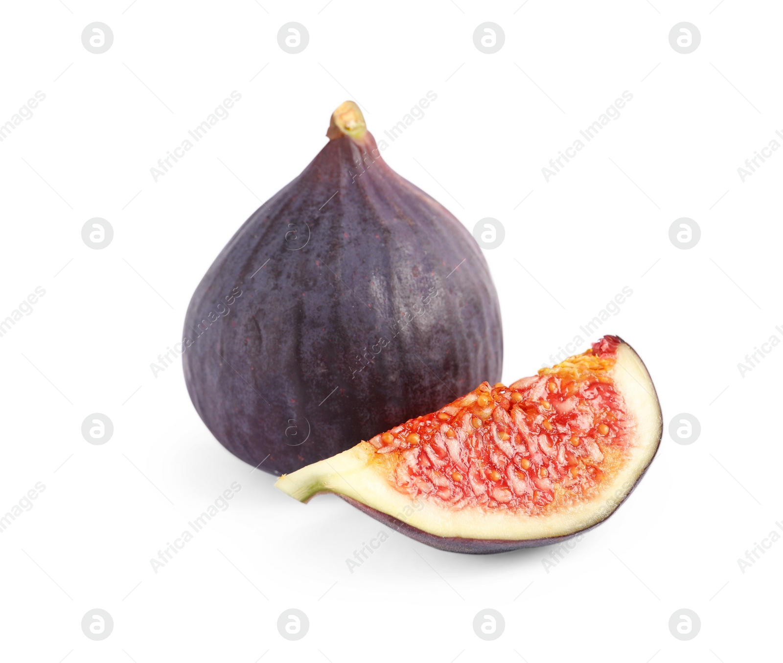 Photo of Cut and whole ripe figs isolated on white