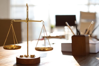 Photo of Scales on table in lawyer's office