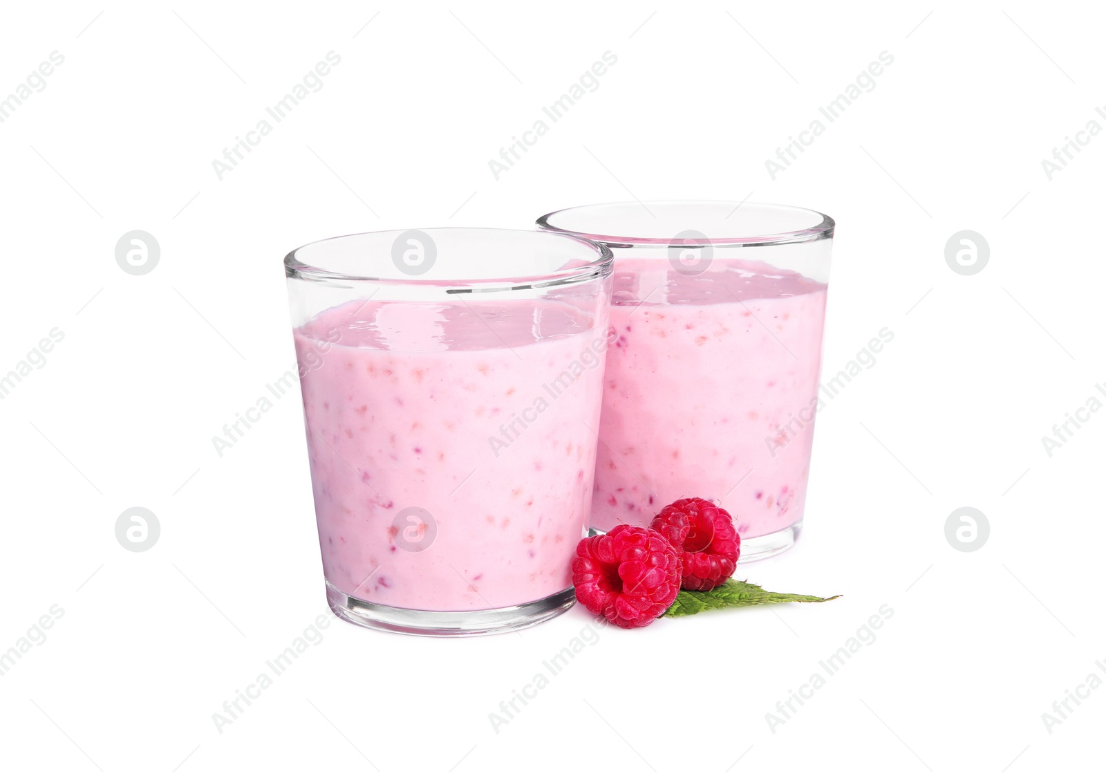 Photo of Tasty fresh raspberry smoothie in glasses on white background