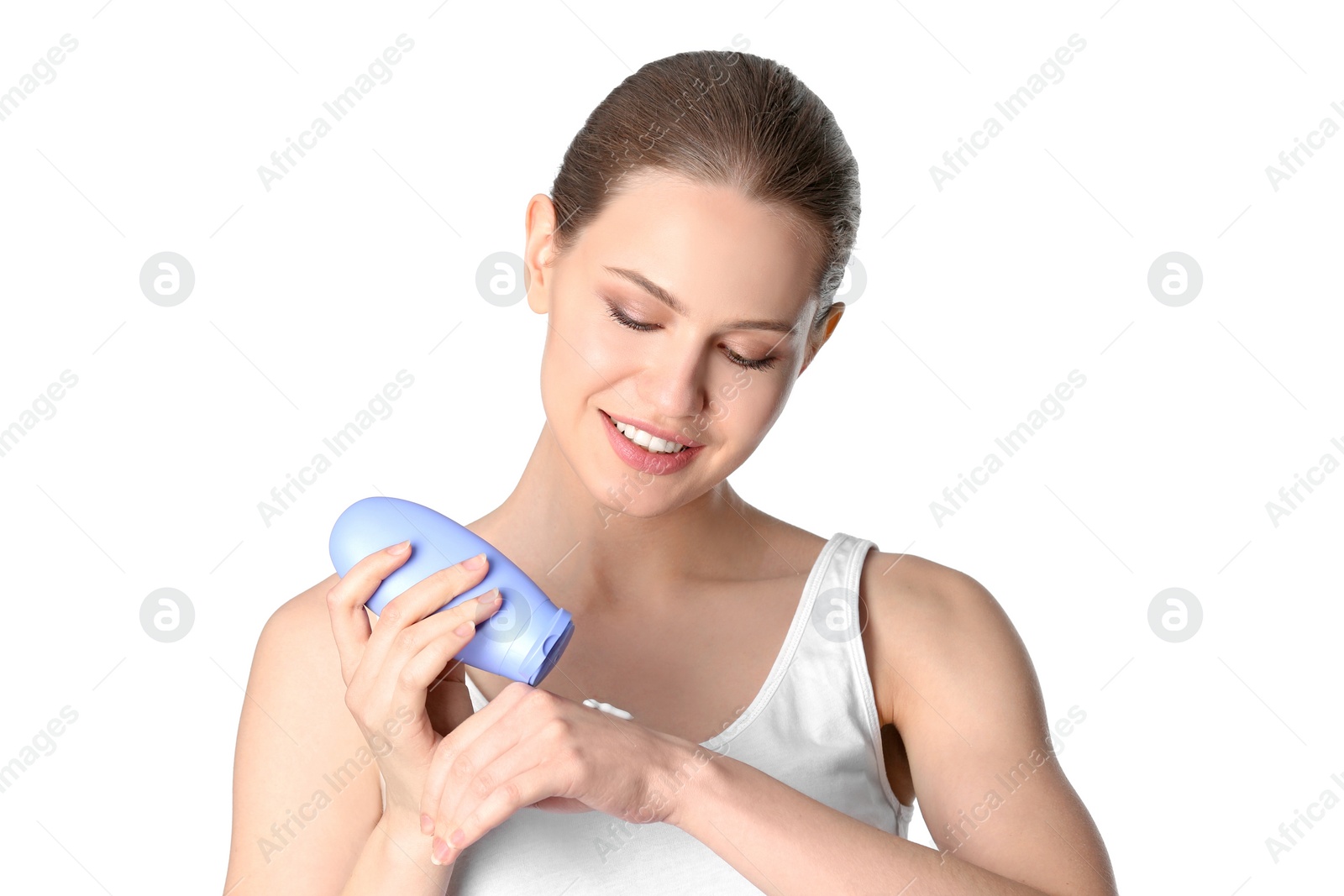 Photo of Young woman applying hand cream on white background