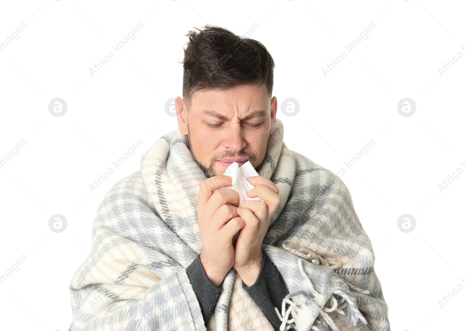 Photo of Man wrapped in blanket suffering from cold on white background