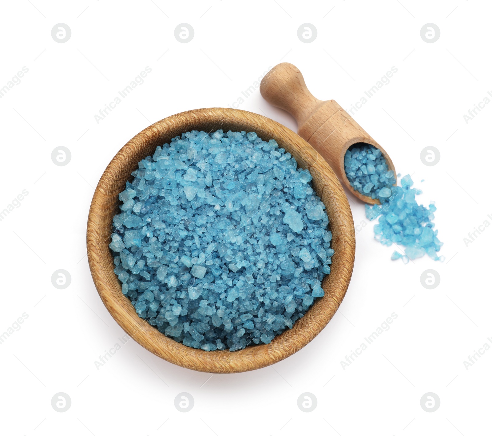 Photo of Bowl and scoop with blue sea salt isolated on white, top view