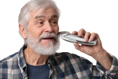 Photo of Senior man trimming beard on white background