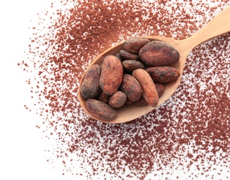 Spoon with cocoa beans on white background