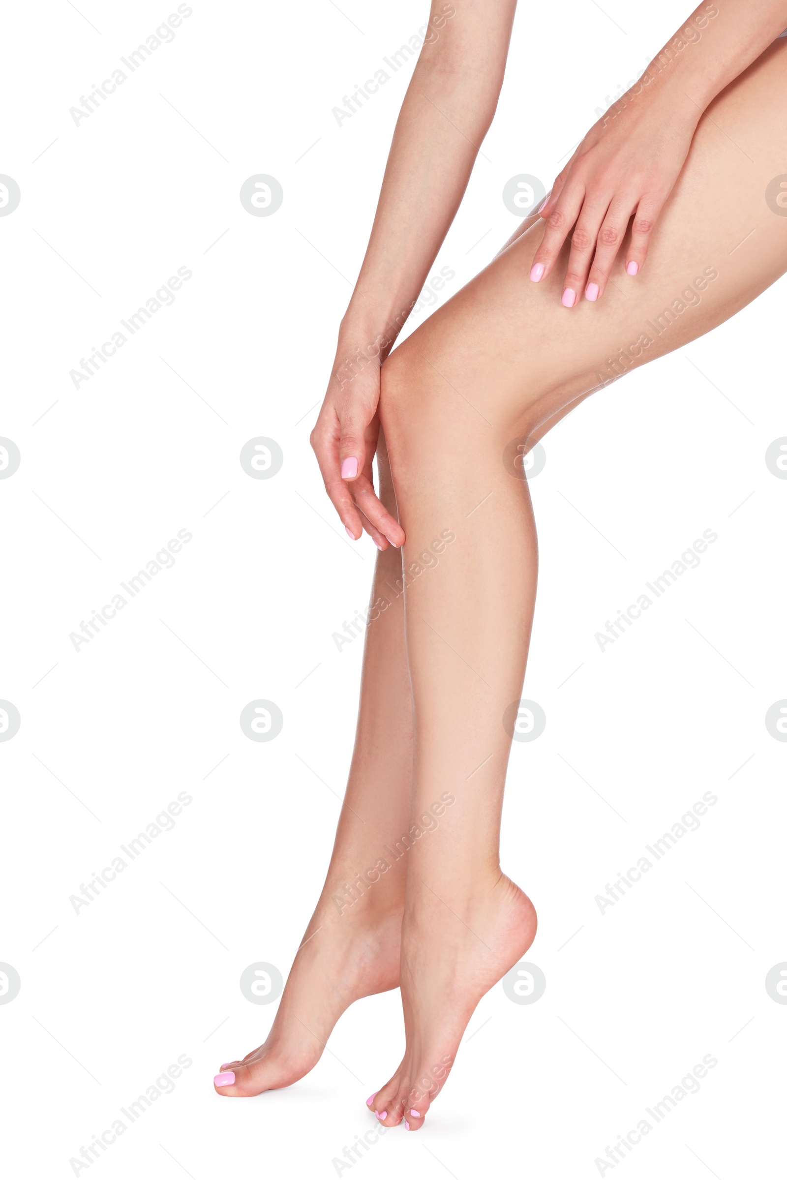 Photo of Woman with beautiful long legs on white background, closeup