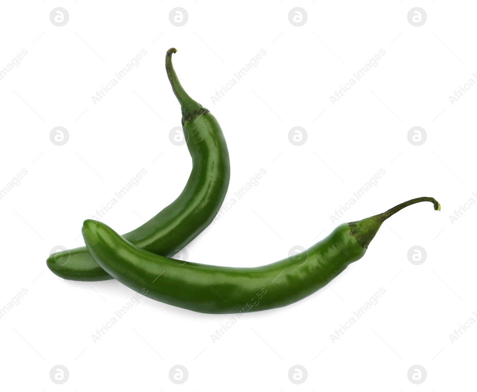 Photo of Green hot chili peppers on white background