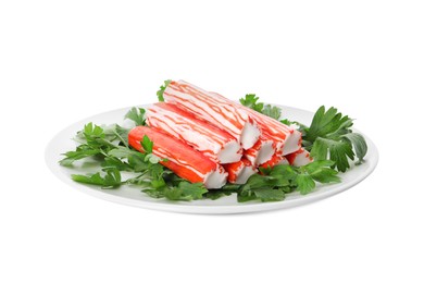 Plate with crab sticks and parsley on white background