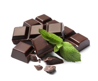 Pieces of dark chocolate with mint on white background