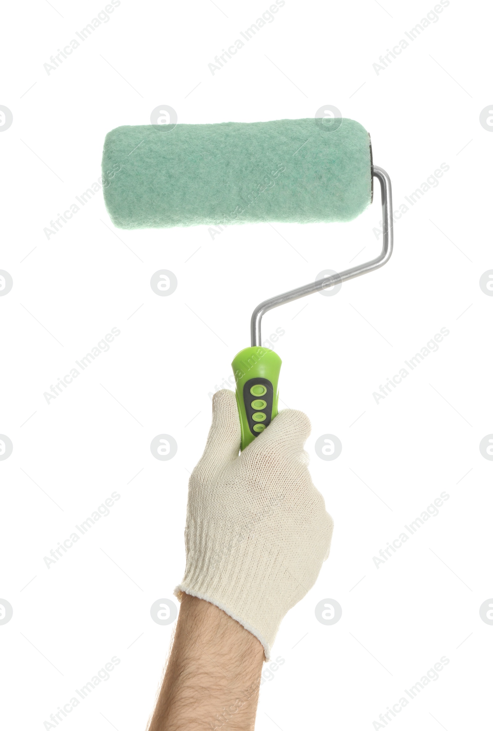 Photo of Man holding paint roller brush on white background, closeup