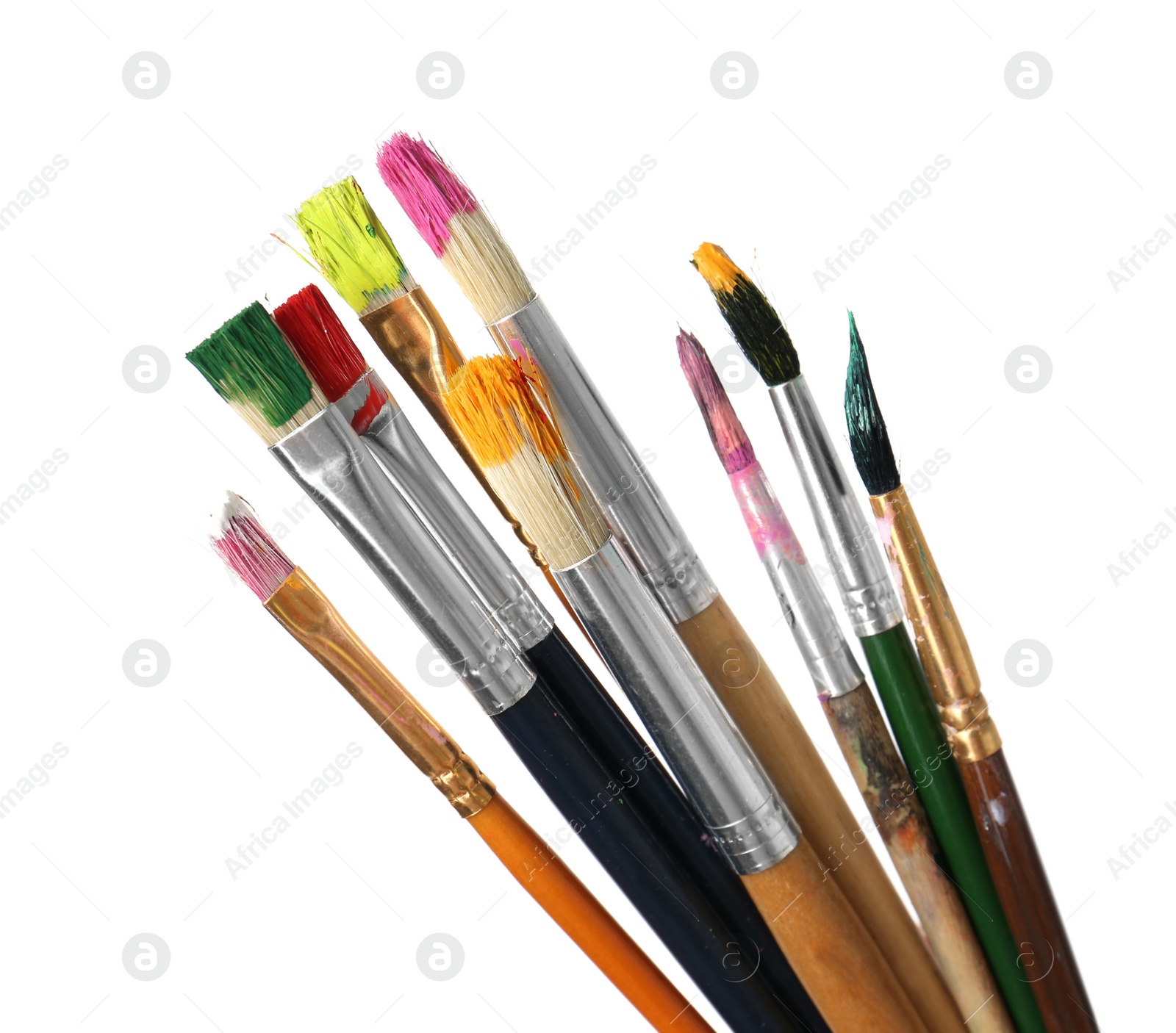 Photo of Different brushes with paints on white background