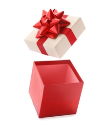 Photo of Open empty gift box with bow on white background