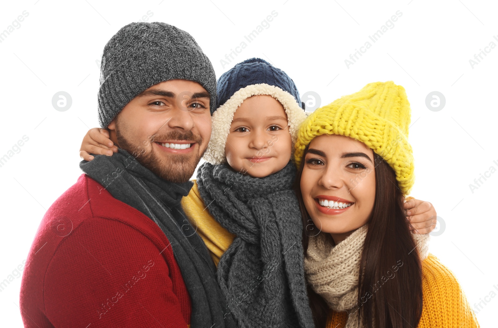 Photo of Happy family in warm clothes on white background. Winter vacation