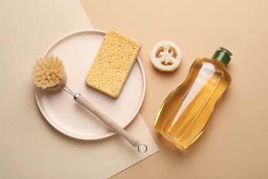 Photo of Flat lay composition with sponge and other bath supplies on beige background