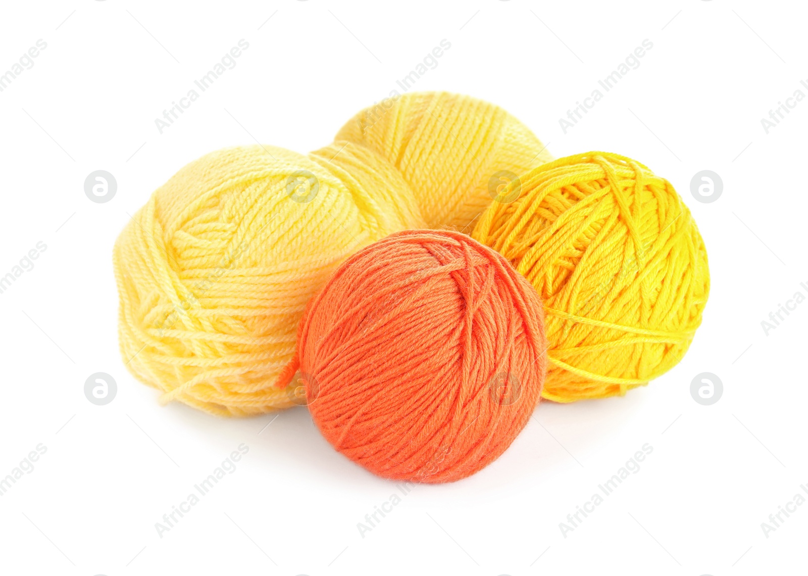 Photo of Soft colorful woolen yarns on white background