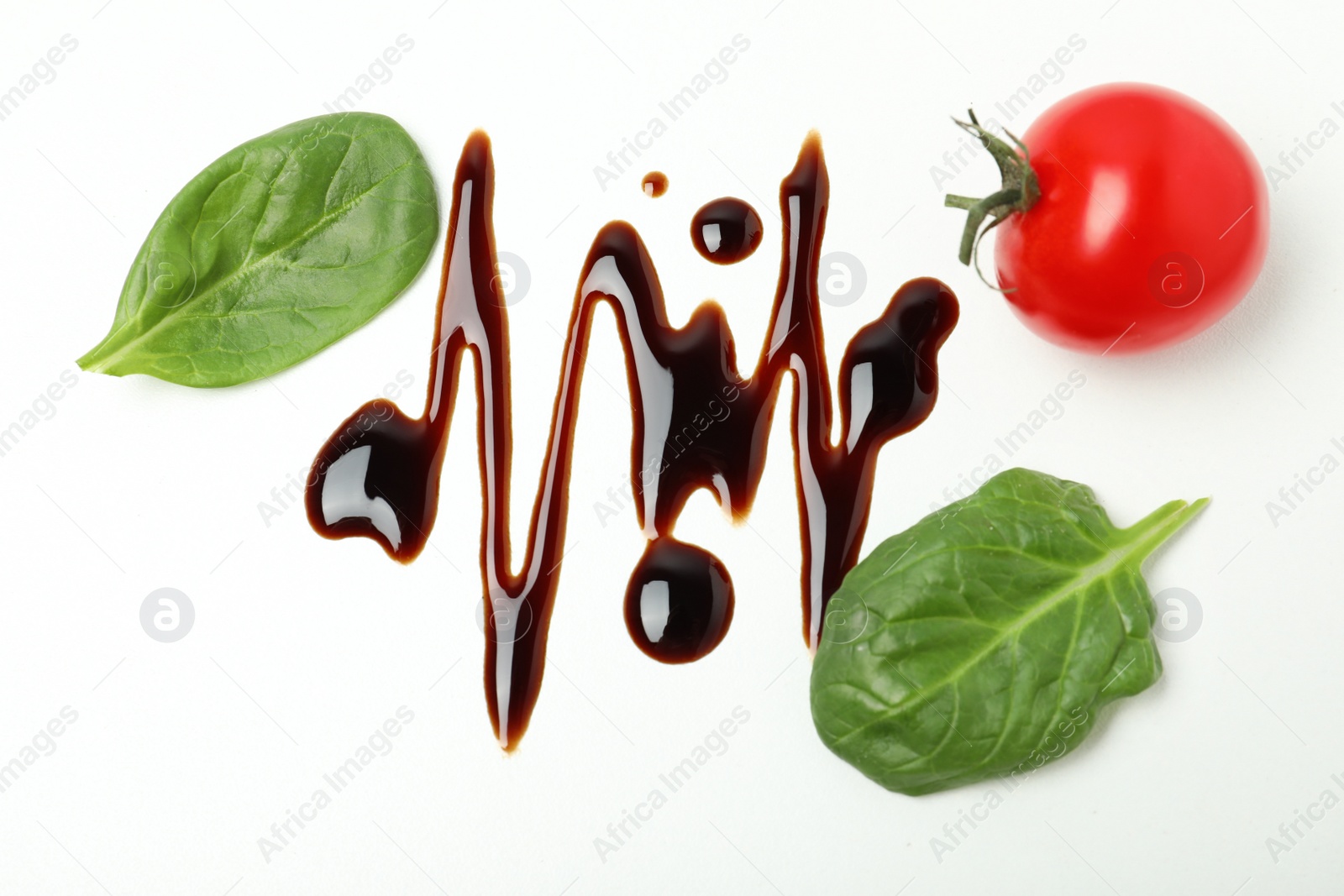 Photo of Composition with balsamic vinegar isolated on white, top view