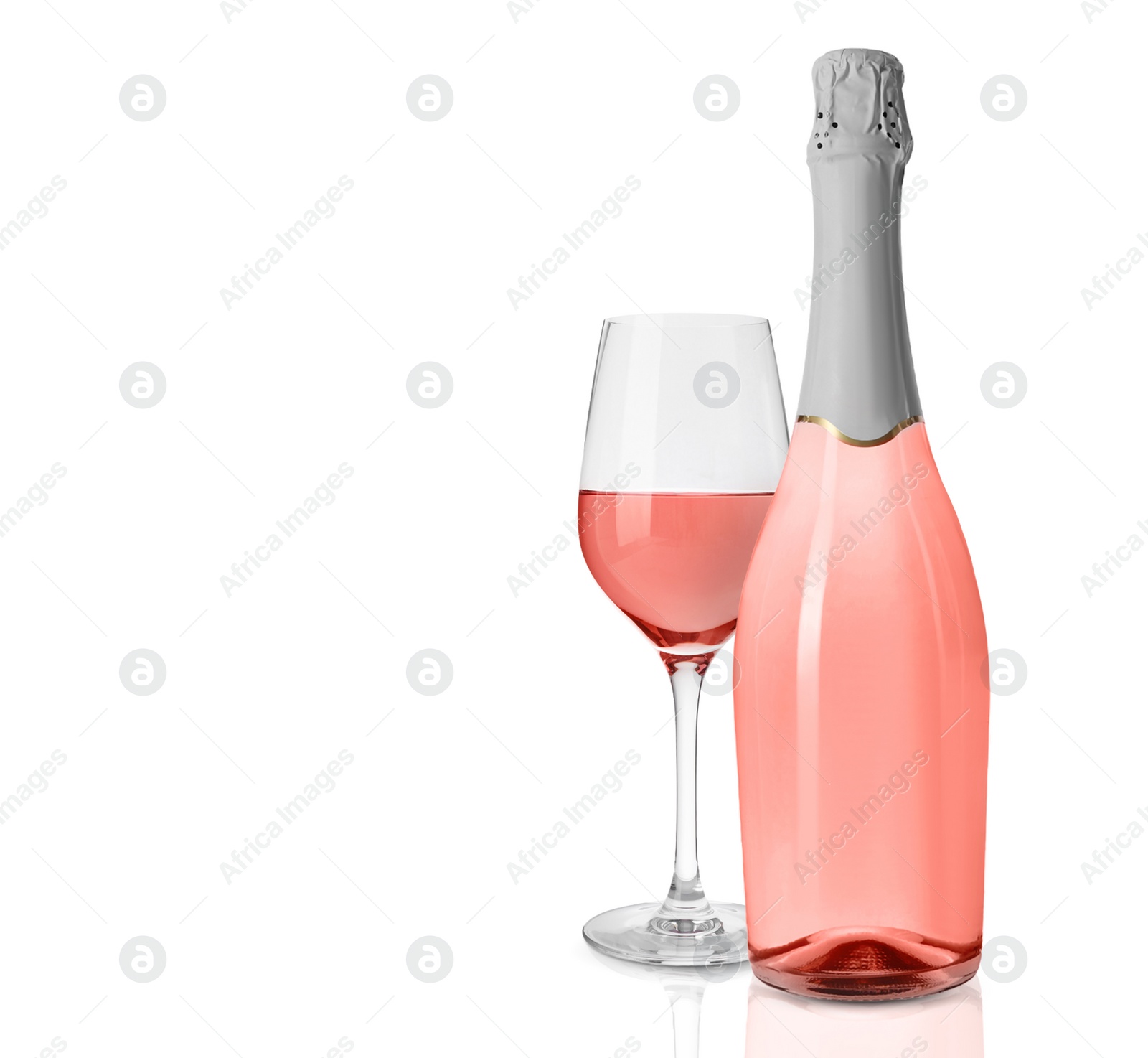 Image of Bottle and glass of delicious rose wine on white background