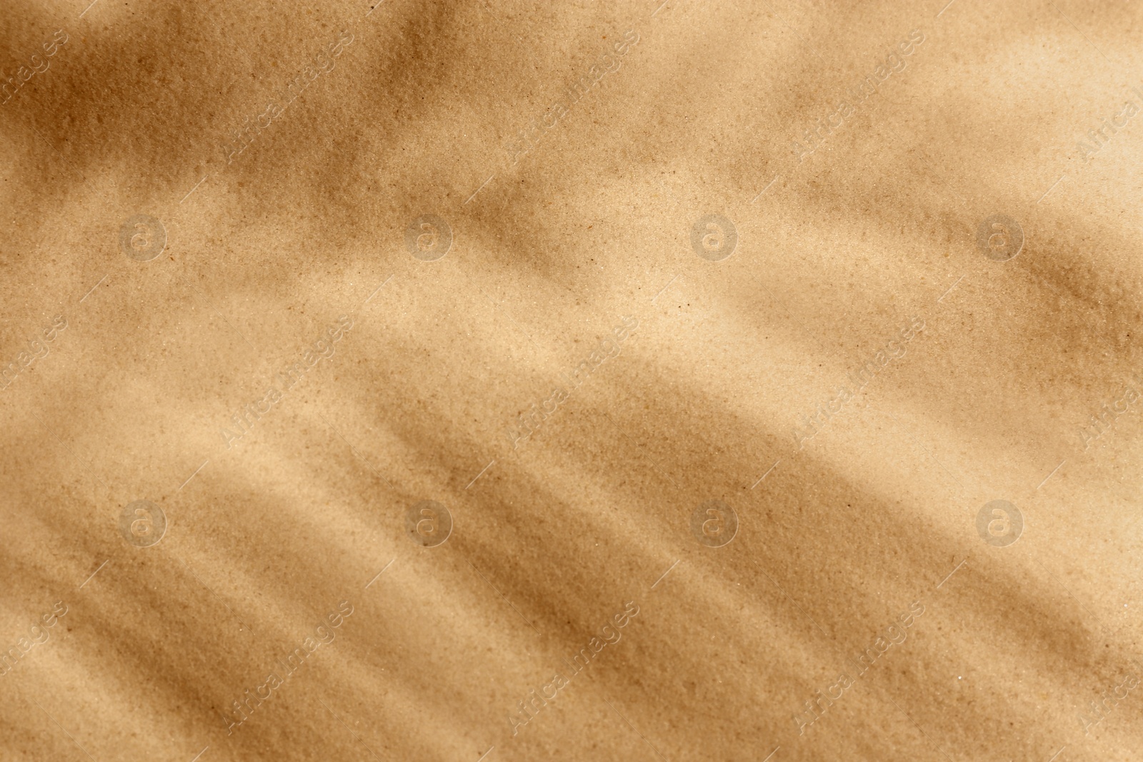 Photo of Dry beach sand as background, top view