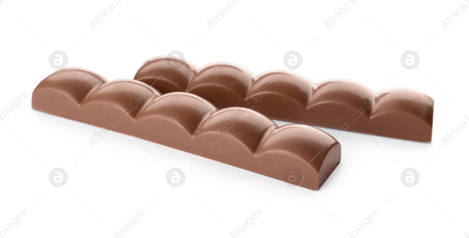 Photo of Mini milk chocolate bars isolated on white