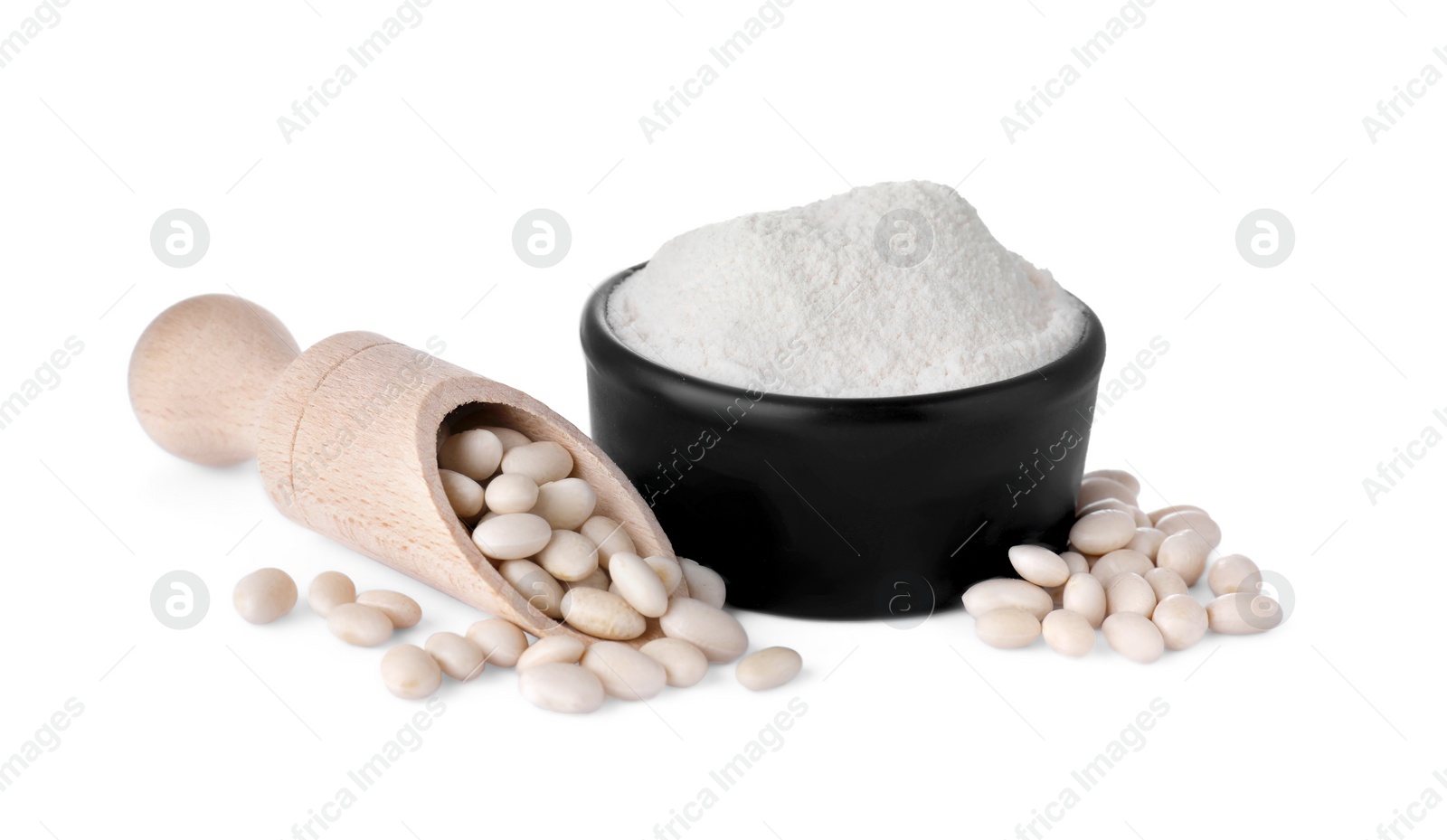 Photo of Bowl with flour, wooden scoop and kidney beans isolated on white