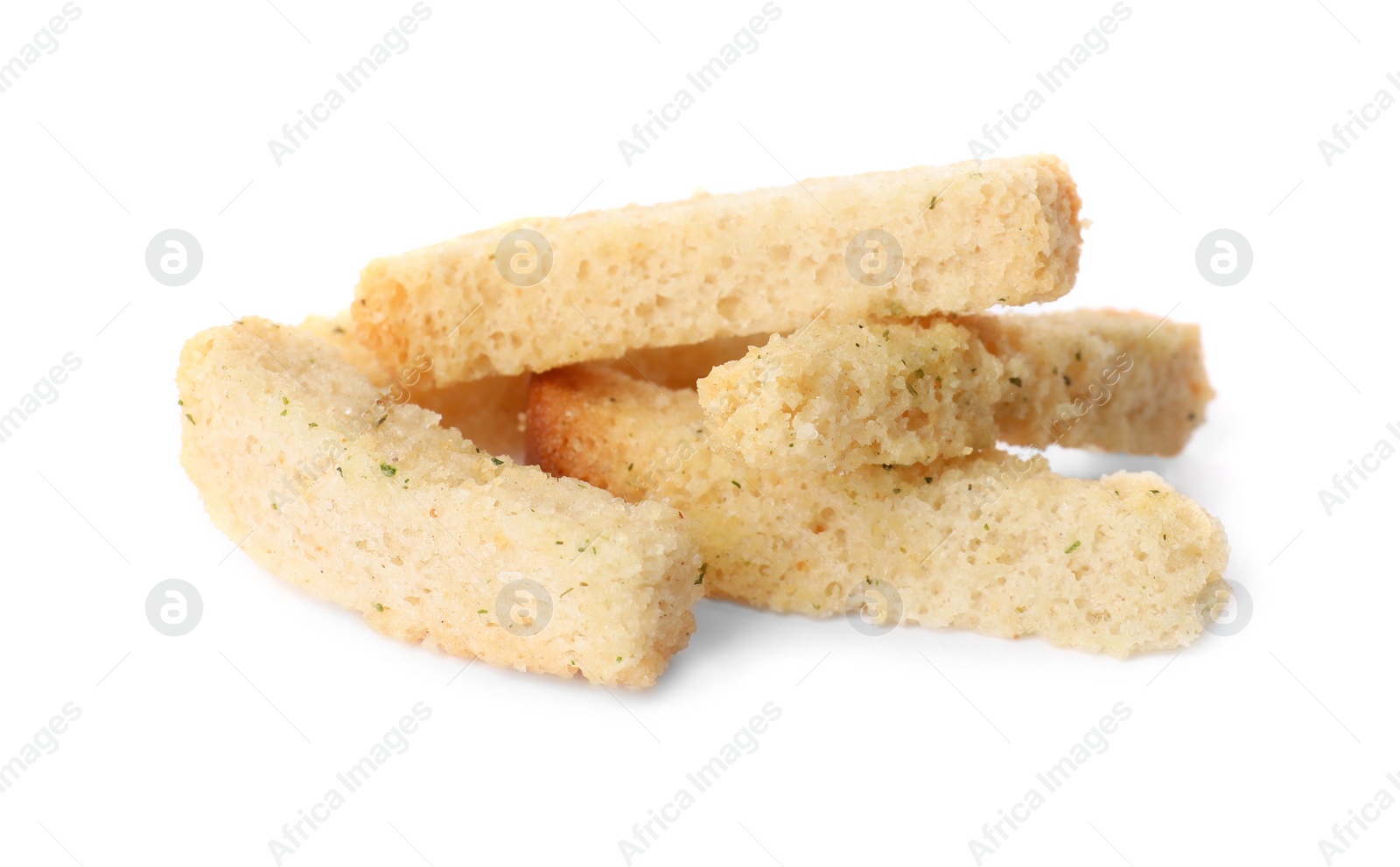 Photo of Heap of crispy rusks with seasoning on white background