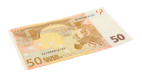 Fifty Euro banknote lying on white background