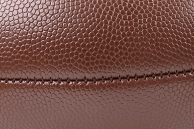 Leather rugby ball as background, closeup view