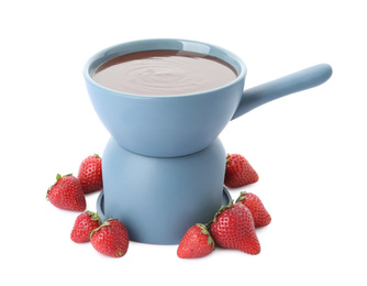 Photo of Fondue pot with chocolate and fresh strawberries isolated on white