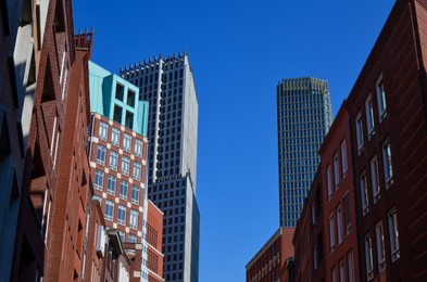 Photo of Exterior of beautiful modern buildings against blue sky