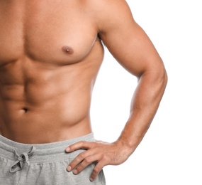 Young man with slim body on white background, closeup view