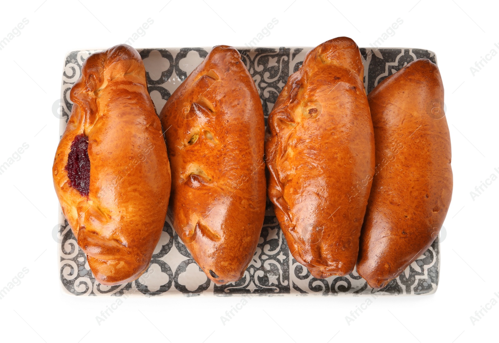 Photo of Plate with delicious baked patties on white background, top view