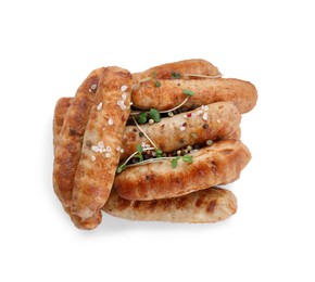Tasty grilled sausages with spices and microgreens isolated on white, top view