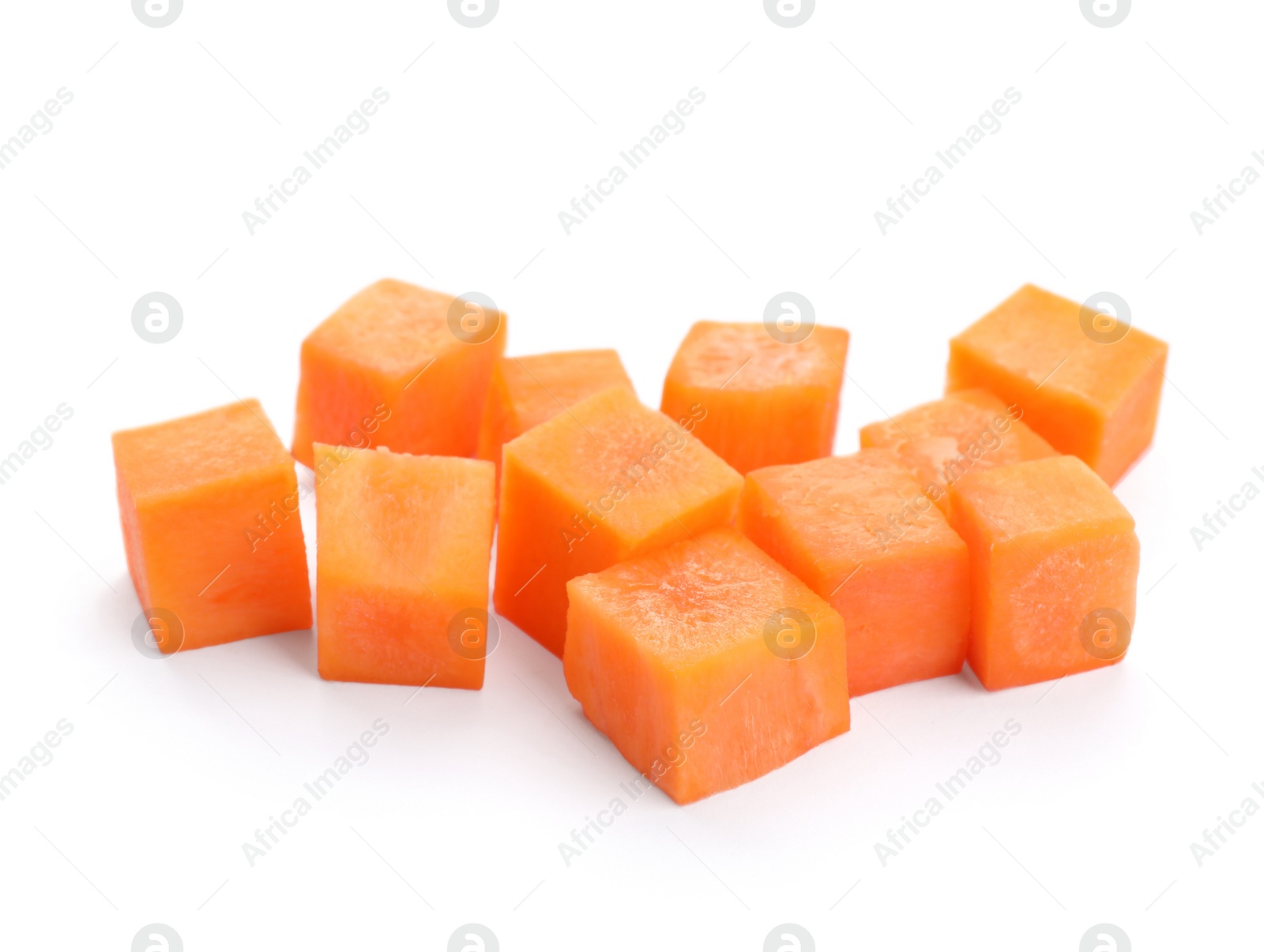 Photo of Fresh ripe carrot cut in cubes on white background