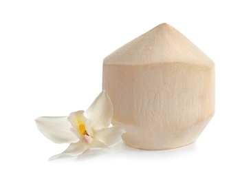 Photo of Fresh peeled coconut and flower on white background