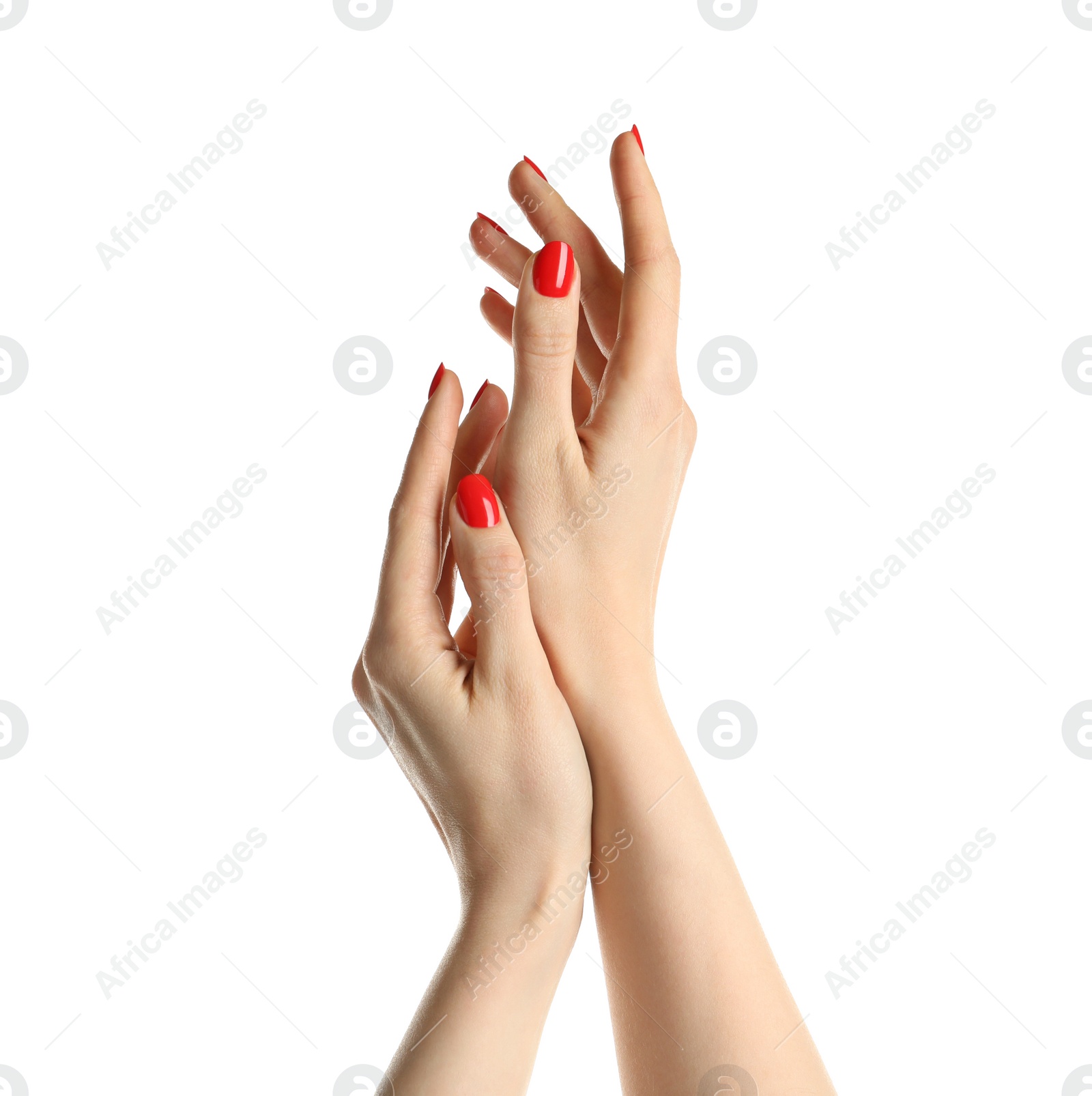 Photo of Woman showing manicured hands with red nail polish on white background